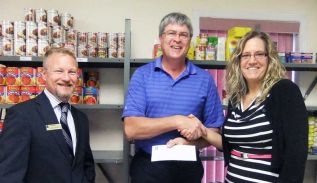 L-r: Michael Adamcryck, regional vice president, RBC; David Townsend, SFCSC executive director; Tina Hinch, Sydenham branch manager, RBC